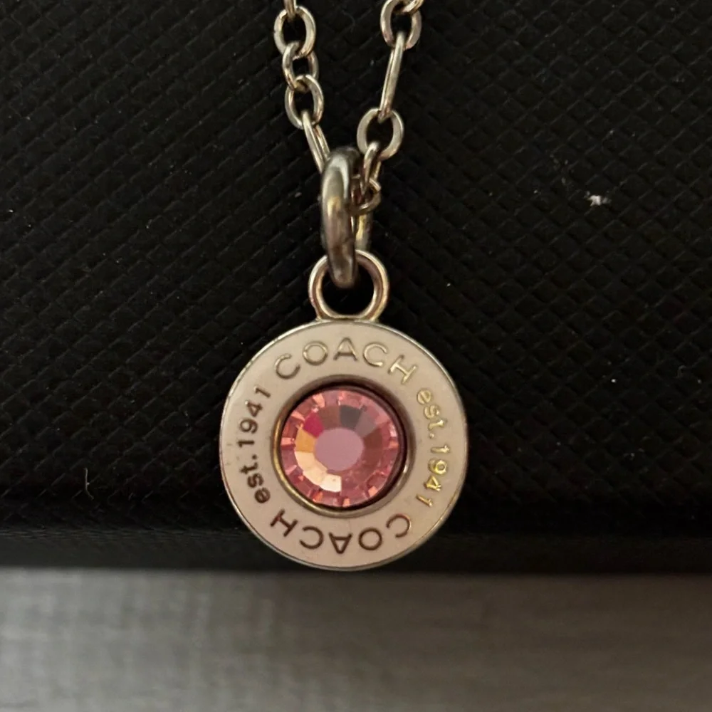 Coach Silver Necklace- White “COACH” Charm with Pink Rhinestone Center - Picture 8 of 8